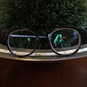 Dark tortoise shell with flecks of blue